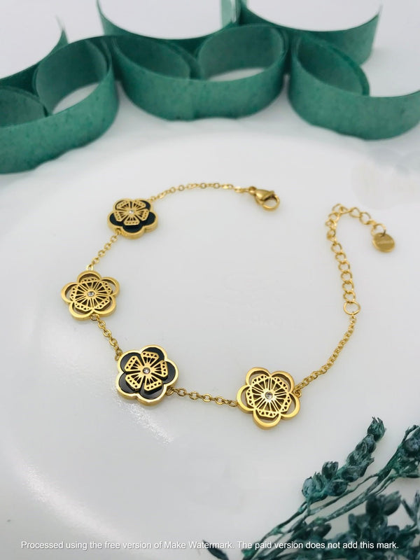 Classic Gold Chain with Black and Gold Flower Design with Some Gold Element Chain